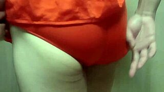 cute girl in swimsuit forced to insert huge anal plug during training