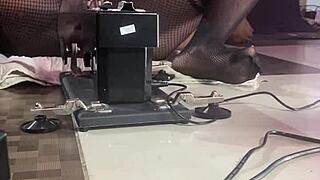 Black pussy porn star fucks sex machine with smooth operator.