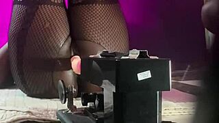 Black pussy porn star fucks sex machine with smooth operator.