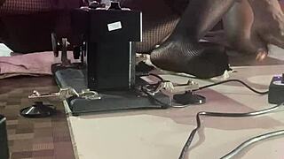 Black pussy porn star fucks sex machine with smooth operator.