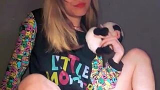 Bonneyuwu masturbates with dildo and plushie in pajamas.