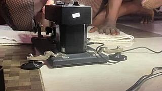 Black pussy porn star fucks sex machine with smooth operator.