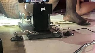 Black pussy porn star fucks sex machine with smooth operator.