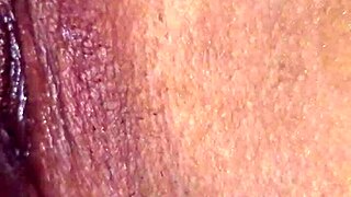 licking and fingering her pussy