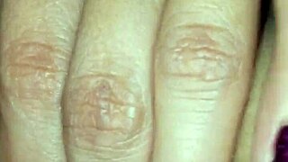 licking and fingering her pussy