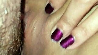 licking and fingering her pussy