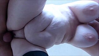 Mature amateur BBW with huge tits, fucked from behind?