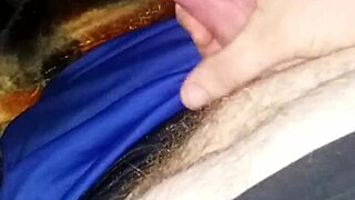 He jerks off to a teen's big cumshot, watching the hot scene unfold with intense pleasure.