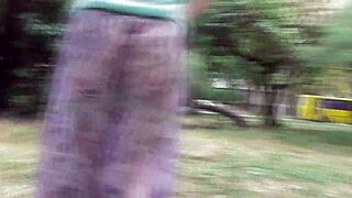 hairy mature woman in transparent dress flashing outdoors