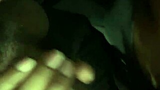 a woman skillfully performs a blowjob on a big dick in an outdoor setting