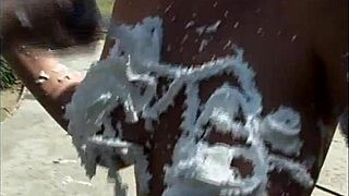 Titty Mania Volume 9 Scene 3 Features Blonde and Brunette Lesbian Action with Dildos and Outdoor Muff Diving