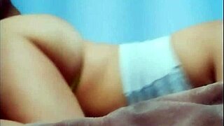 In this real amateur scene, a mature brazilian woman enjoys with four partners in a homemade group setting