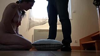 slave girl poses with collar for humiliating sessions