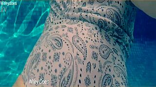 Wife Swimming in Hotel Pool