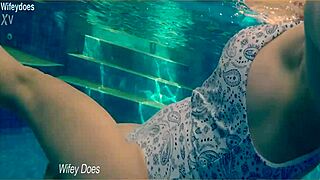 Wife Swimming in Hotel Pool