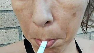 Kelly Kendricks Smokes With Lots Of Cleavage In Sun