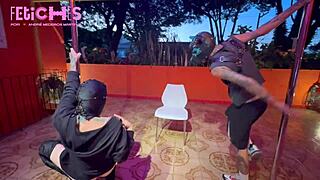 Tattooed girl dances pole for guy