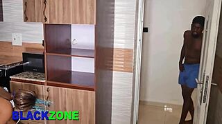 Curvy ebony stepmom fingers her belly in the kitchen