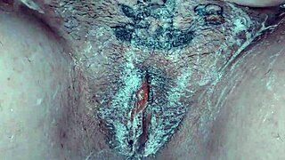 milf shaves pussy up close with soap
