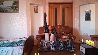 redhead cherry plays with boots over knees in pov assplay