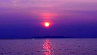 Mature Woman Strolling On The Beach?