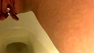 You ever seen a pierced pussy peeing like this?