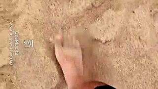 The bare feet gently play in the warm sand, creating a soothing sensory experience for the barefoot enthusiast.