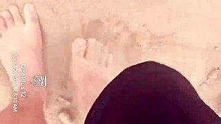 The bare feet gently play in the warm sand, creating a soothing sensory experience for the barefoot enthusiast.