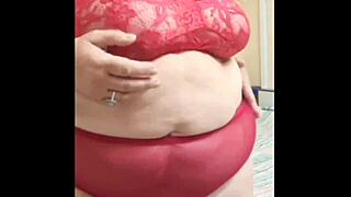 Chubby busty wife enjoys playing with her fat pussy alone