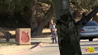 Inked blonde muff diver seduces the wandering cyclist into using a double ended dildo