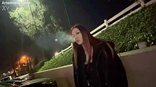 Watch Artemisia Love, the hot Italian milf with long hair, smoke seductively outdoors!