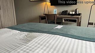 In a hotel room, a hot stepmom invites her stepson to share the bed, leading to taboo anal fun in the shower and spying on her bathing.