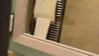 In a hotel room, a hot stepmom invites her stepson to share the bed, leading to taboo anal fun in the shower and spying on her bathing.