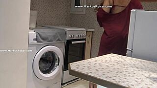 the stupid maid gets stuck in the washing machine, spied on by the voyeur husband