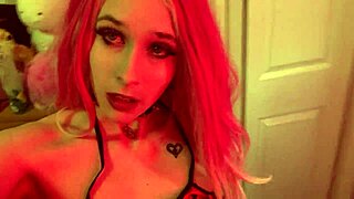 Hot goth girl performs seductive strip tease in lingerie