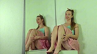 alice klay plays with orange slime on her feet