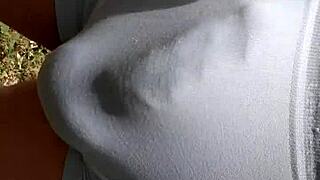 Hard cock hardon bulging in tight shorts outdoor public display