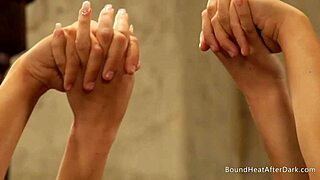 Two sexy lesbian slaves watched and fingered by mistress