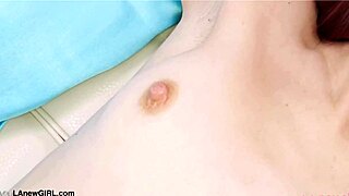 red haired model reveals her sexy body during photoshoot