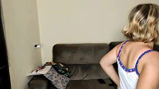 The slutty blonde contrasts her pale skin with a big black cock in the kitchen