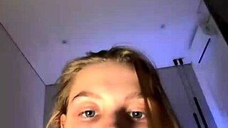 fingering a tight pink pussy on webcam, the young amateur teen orgasms hard from the hardcore masturbation.