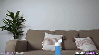 ebony foot model with large soles receives a relaxing booty massage