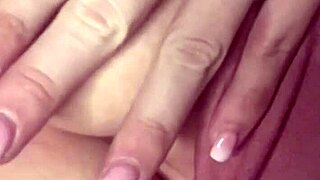 hot blonde showing off her tits softcore