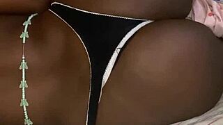 Aline Poses Seductively on Bed