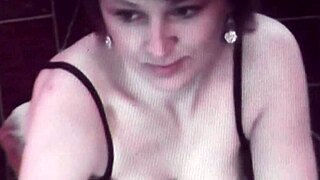 Erotic video clip of sexy milf in fetish stockings and lingerie, solo with big natural tits