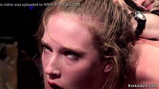 Bound slaves engage in rough fucking at intense BDSM party