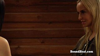 Lesbian girl in handcuffs with big natural tits gets whipped hard