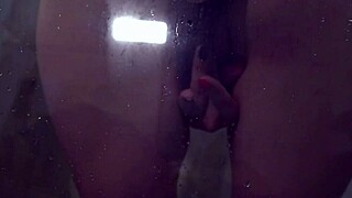 Babe sucks dildo and fucks herself in shower