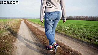 milf walking outdoors in loose jeans with her phat ass