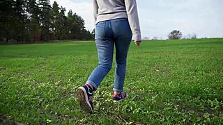 milf walking outdoors in loose jeans with her phat ass